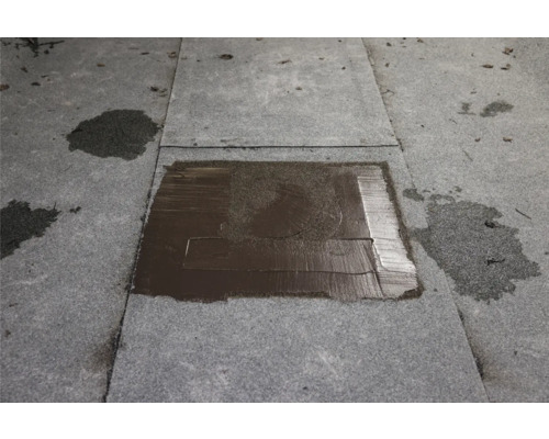 Reparaturstelle auf einem Bitumen Dach