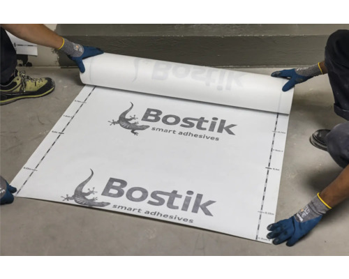 Membrane d''étanchéité Bostik en cours de déroulement