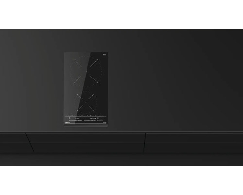 Plaque à induction TEKA avec deux zones de cuisson sur un comptoir de cuisine