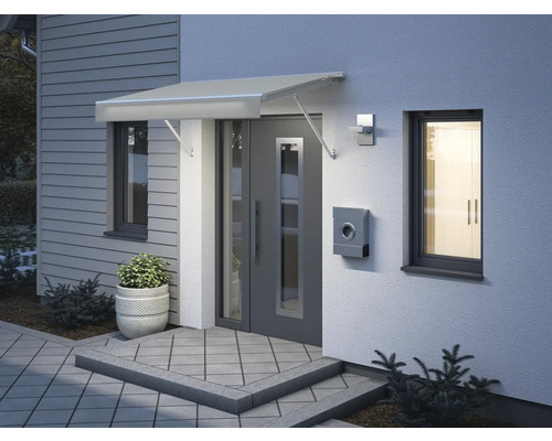 Zone d''entrée d''une maison avec auvent de porte, porte d''entrée et boîte aux lettres