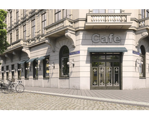 Extérieur d''un café dans un bâtiment de style classique avec des vélos