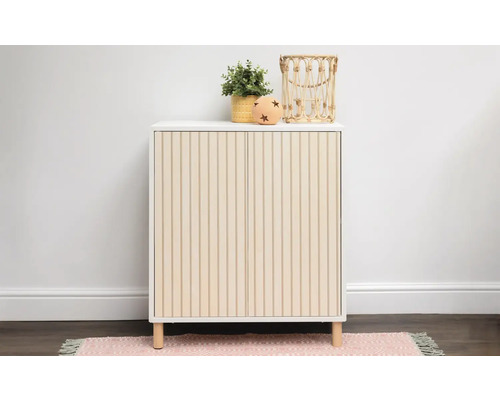 Schrank mit zwei Türen, gerippter Oberfläche und vier Beinen