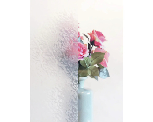 Dekorfolie mit Ornamentstruktur neben Blumenvase