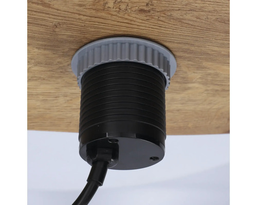 Prise escamotable avec câble dans un plateau de table