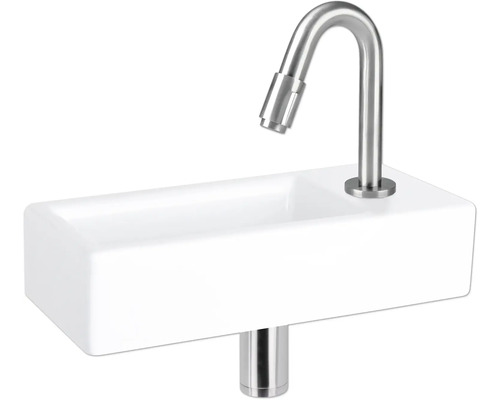 Weißes Aufsatzwaschbecken mit Armatur