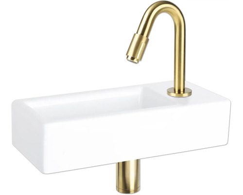 Waschtisch mit goldener Armatur