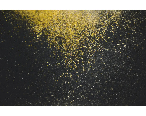 Schwebende Goldstaubpartikel auf dunklem Hintergrund