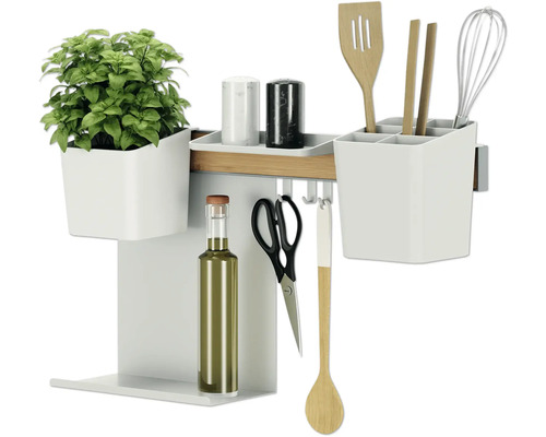 Organisateur d''ustensiles de cuisine avec basilic, épices, huile, ciseaux et ustensiles de cuisine.