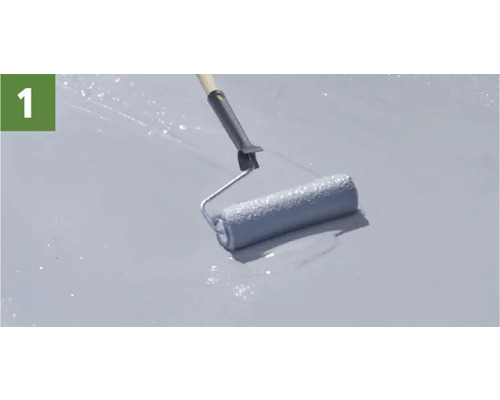 Une personne applique de la peinture sur une surface avec un rouleau à peinture.