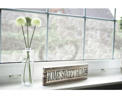 Film décoratif sur fenêtre avec motif floral, vase et décoration