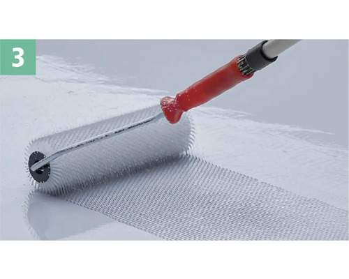 Rouleau débulleur en cours d''utilisation sur une surface revêtue