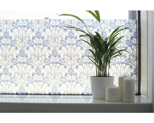Fenêtre avec film statique pour fenêtre à motif floral, plante en pot et bougies