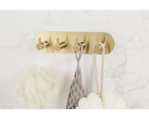 Porte-manteau mural avec quatre crochets et accessoires de bain
