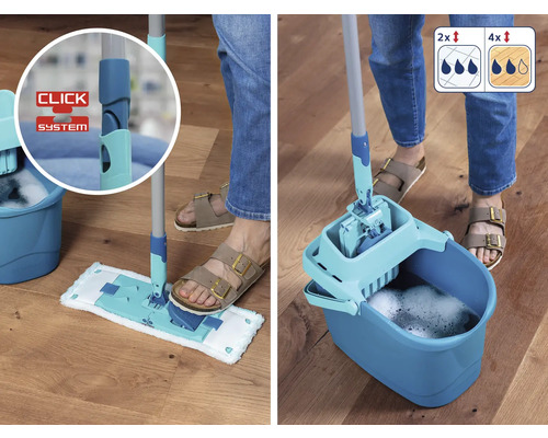 Serpillière avec seau et essoreuse sur un plancher en bois