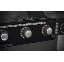 Gros plan d''un barbecue à gaz noir avec des boutons rotatifs pour contrôler la chaleur.