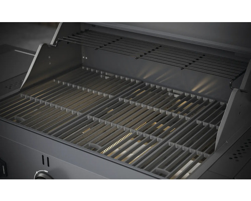 Innenansicht eines Gasgrills mit Grillrost und Warmhalterost.