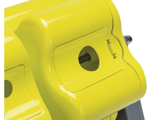 Vue détaillée d''une machine jaune avec une ouverture ronde