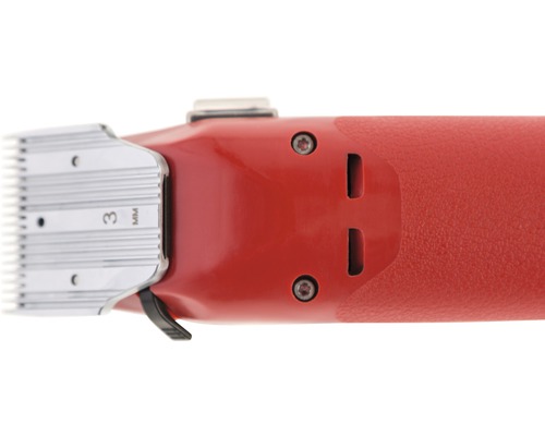 Tondeuse à cheveux rouge avec une longueur de coupe de 3 millimètres