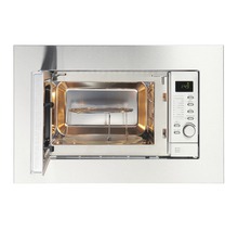 Four à micro-ondes encastrable ouvert en acier inoxydable avec plateau tournant et grille.
