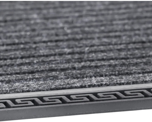 Fußmatte mit Mäandermuster am Rand