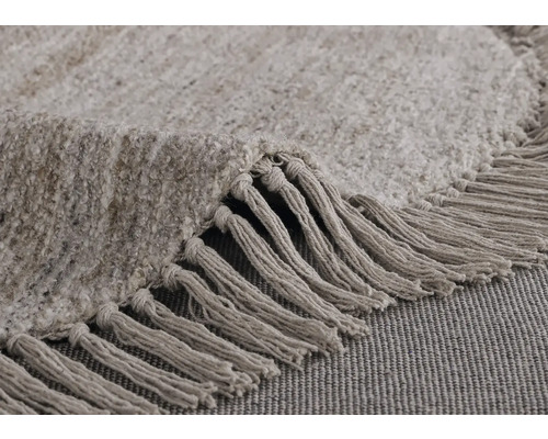 Vue détaillée d''un tapis rond à franges