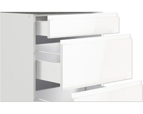 Gros plan d''un meuble de salle de bains blanc avec tiroirs