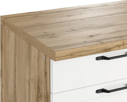Gros plan d''un élément de commode avec surface en bois et tiroirs avec poignées