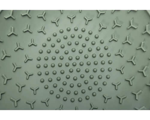 Detailaufnahme einer Duschmatte mit Noppen und Dreiecksdesign