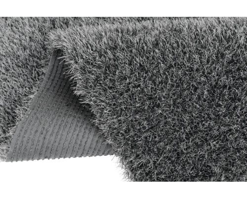 Gazon synthétique avec fonction de drainage