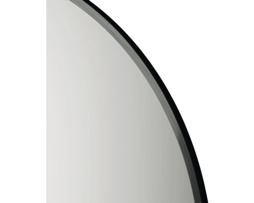 Detailaufnahme eines runden Spiegels mit Rahmen