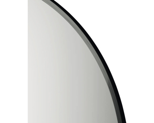 Détail d''un miroir rond avec un cadre foncé