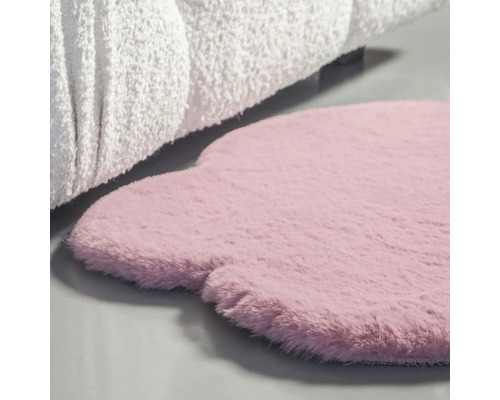 Rosa Teppich in Form einer Bärenpfote