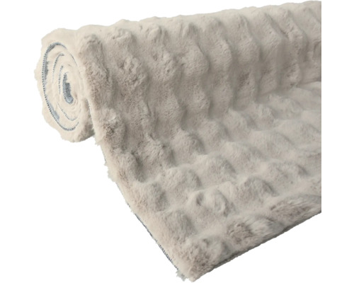 Aufgerollter, weicher Stoff mit Muster