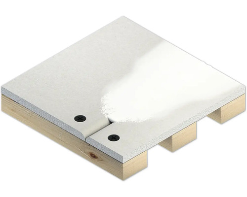 Vue détaillée de plaques de plâtre reliées entre elles sur une sous-construction en bois avec des vis.