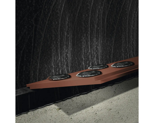 Vue détaillée d''une membrane alvéolaire de drainage avec des réservoirs de lubrifiant moulés.