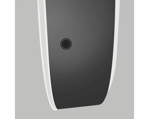 Vue détaillée d''un appareil électronique avec un bouton rond