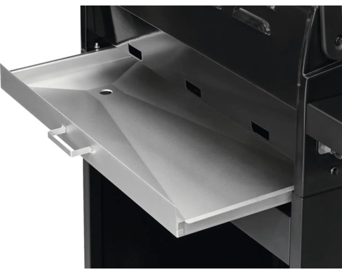 Gros plan d''un barbecue à charbon de bois avec un tiroir à cendres sorti