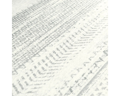 Vue détaillée d''un tapis avec motif géométrique
