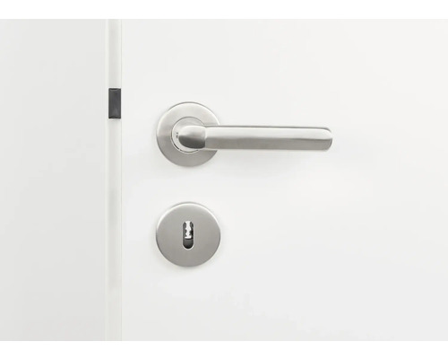 Porte avec poignée de porte et serrure