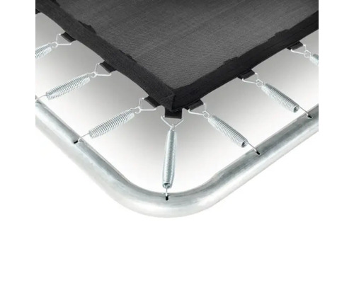 Vue détaillée du trampoline avec ressorts et cadre.