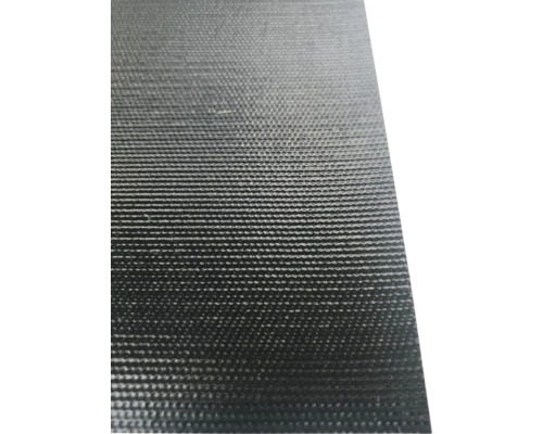 Gros plan d''une plaque à plots noire en plastique