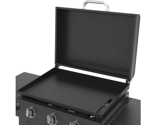 Plancha ouverte avec couvercle et éléments de commande.