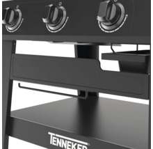 Vue détaillée d''un barbecue à gaz noir avec boutons rotatifs, support pour essuie-tout et surface de rangement de la marque Tenneker.