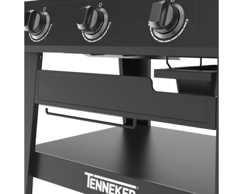 Vue détaillée d''un barbecue à gaz noir avec boutons rotatifs, support pour essuie-tout et surface de rangement de la marque Tenneker.