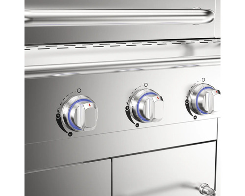 Gros plan d''un barbecue à gaz en acier inoxydable avec des boutons rotatifs