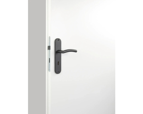 Schwarze Innentürgarnitur mit Schlüsselrosette an einer weißen Tür