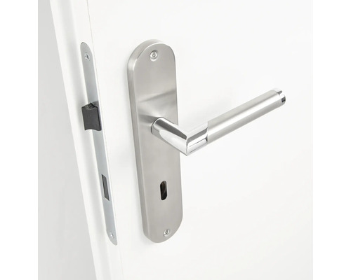 Garniture de porte en acier inoxydable avec rosace de clé sur une porte