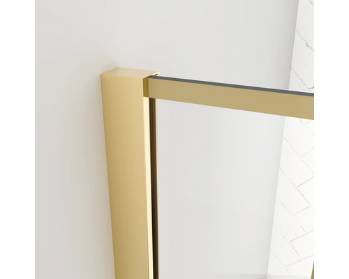 Vue détaillée d''une cabine de douche avec cadre doré.