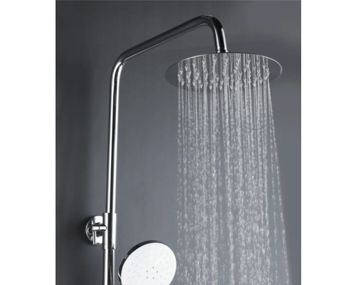 Système de douche avec douchette de tête et douchette à main en fonctionnement