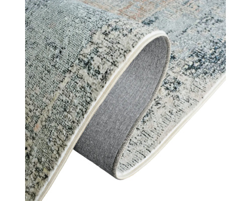 Tapis enroulé avec motif